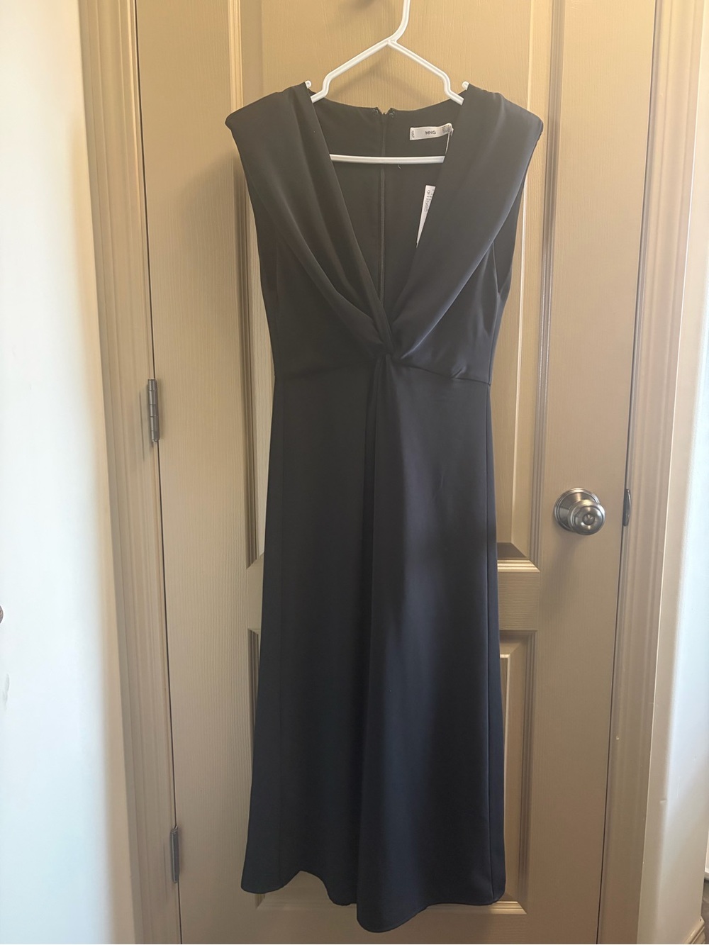 Elegant Black Sleeveless Dress with Draped V-Neck